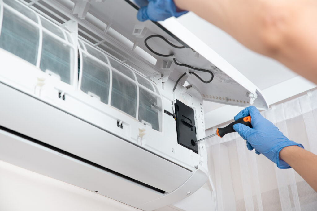 HVAC technician installing a new ductless mini-split 